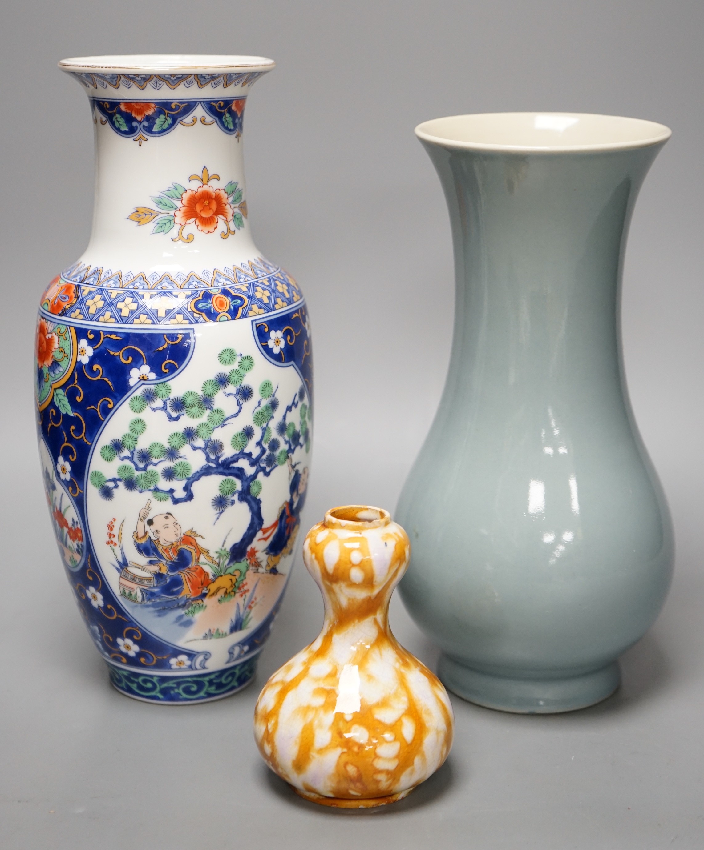 A Chinese Clair De Lune glazed baluster vase and two other Chinese vases. Tallest 26.5cm